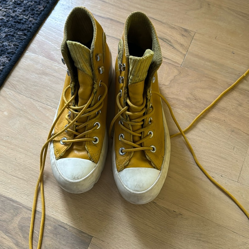 Converse yellow leather platform high tops